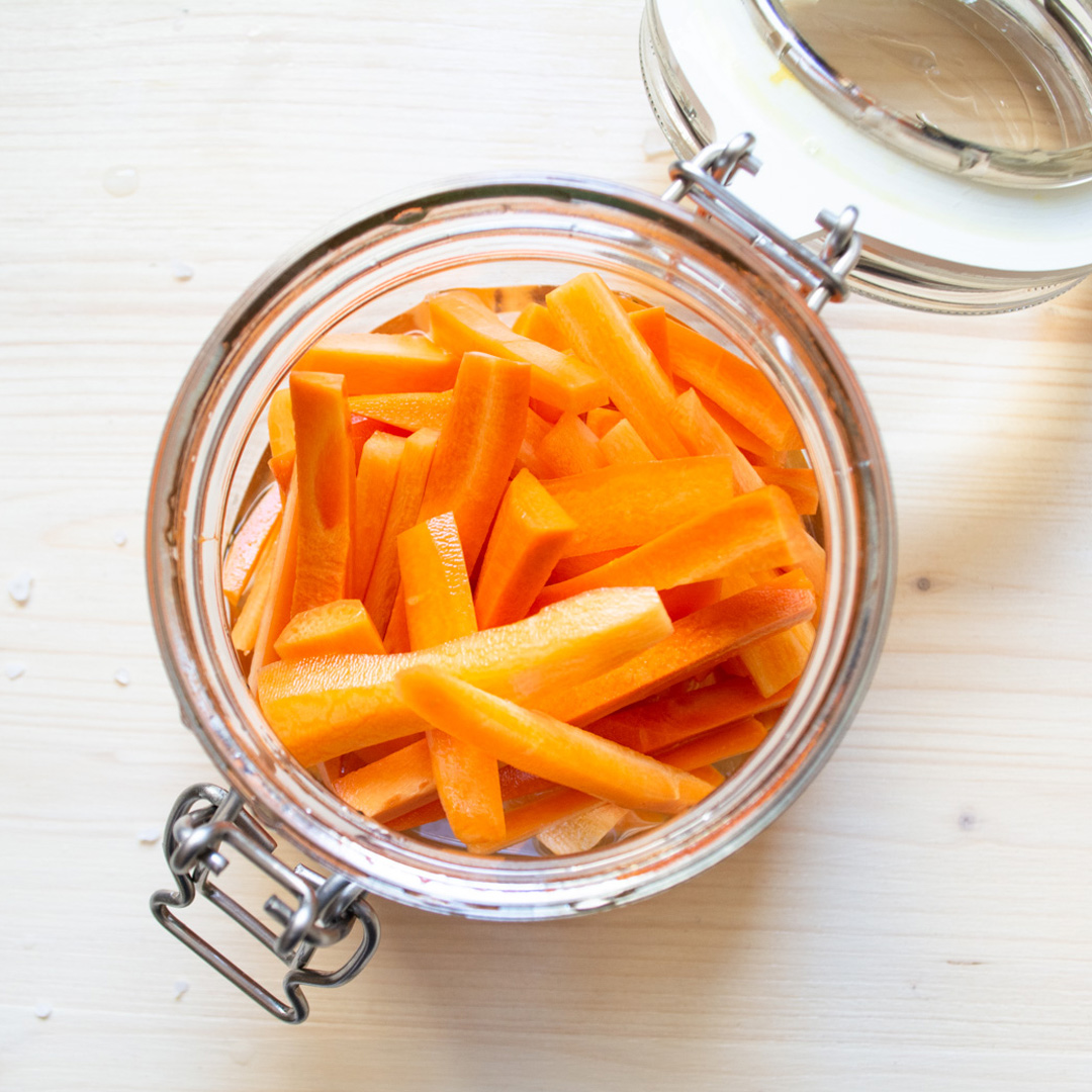 Carrot Pickles in open glass jar
