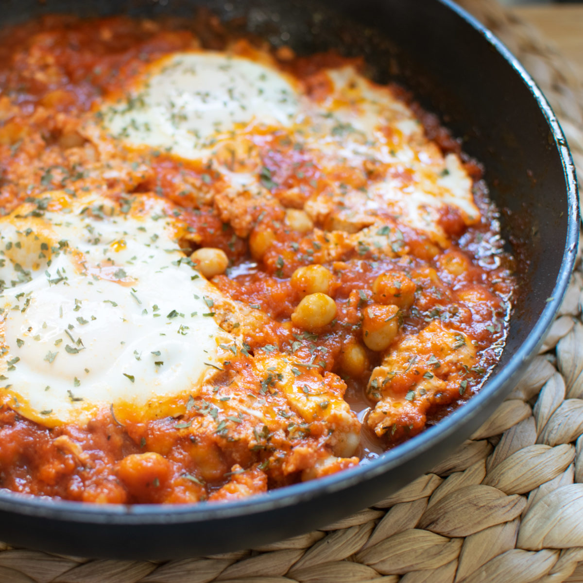 White Beans and eggs in tomato sauce in Frying Pan