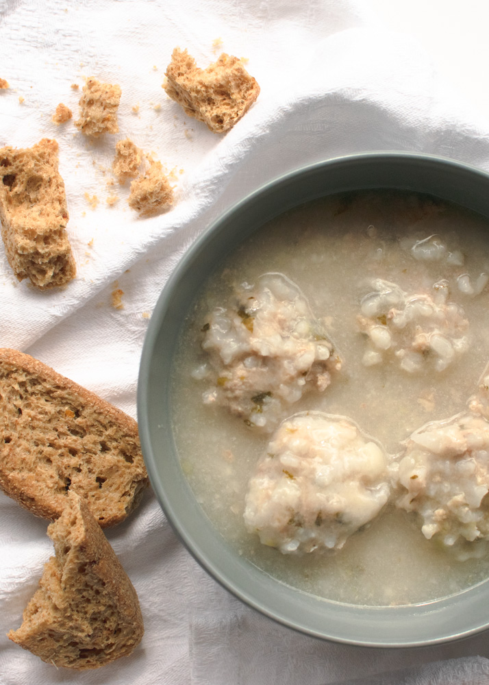RiceMeatball Soup in grey bowl with rye rusks